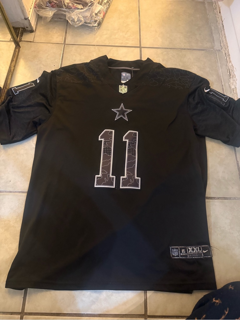 NFL Black Jersey Tag with Blue and White Labeling